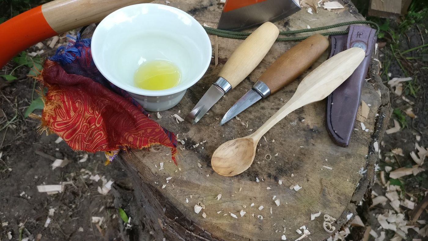 Carved Spoon Being Oiled photo 1