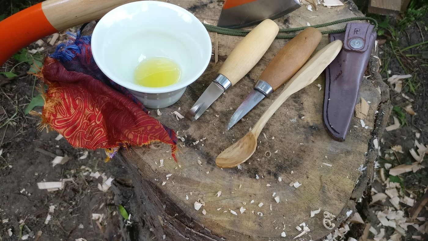 Carved Spoon Being Oiled photo 2